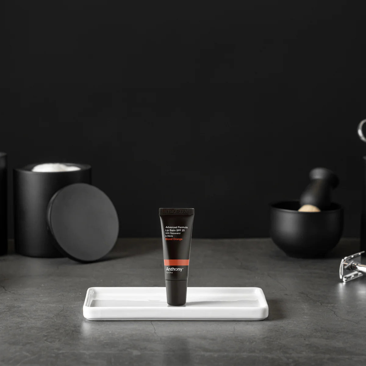 بلسم شفاه بالبرتقال الأحمر، بعامل حماية من الشمس 25